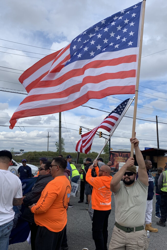 a group of people holding flags